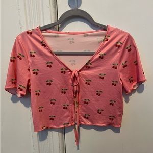 Pink crop top with cherries graphic